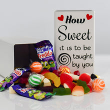 Load image into Gallery viewer, Ivory tin with black vinyl label - How sweet it is taught by you with a picture of a the tin covered in sweets and chocolate