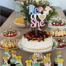 Load image into Gallery viewer, A cake topped with fresh fruit and a cake topper "He or She" with a love heart