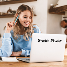 Load image into Gallery viewer, Picture of a lady at a kitchen bench with a laptop showing a decal with the name Frankie Howlett
