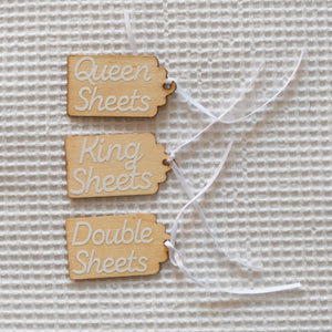 Wooden tag with label